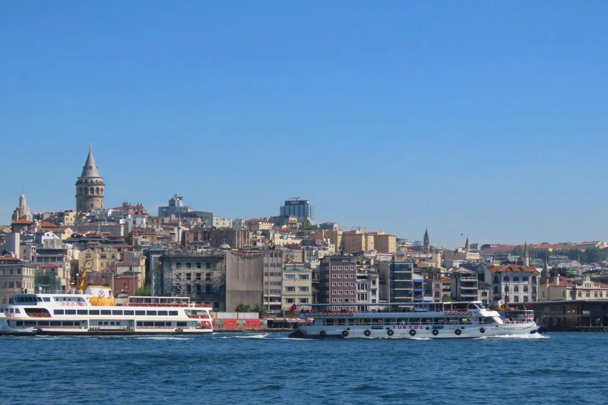 Galata Tower and the Karaköy waterfront seen from the water in Istanbul